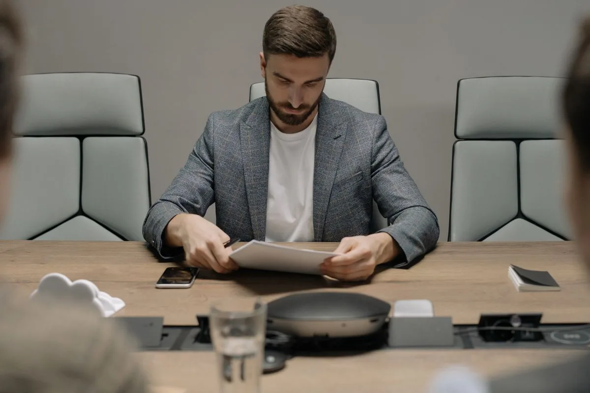 Business professional reviewing contract documents