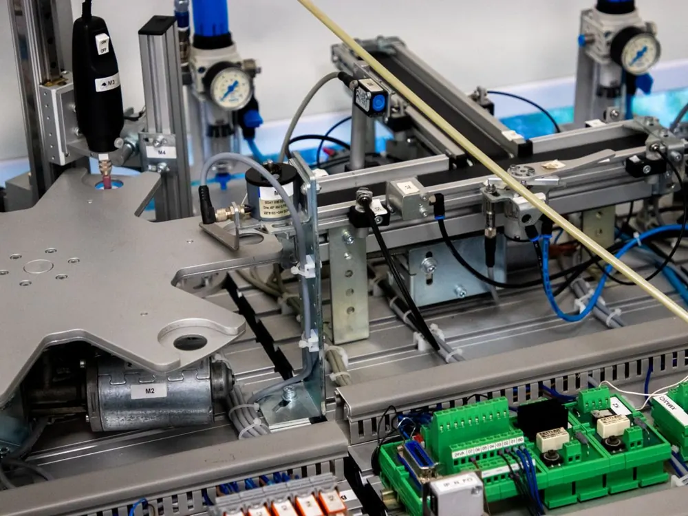 Industrial machinery with wiring and mechanical components